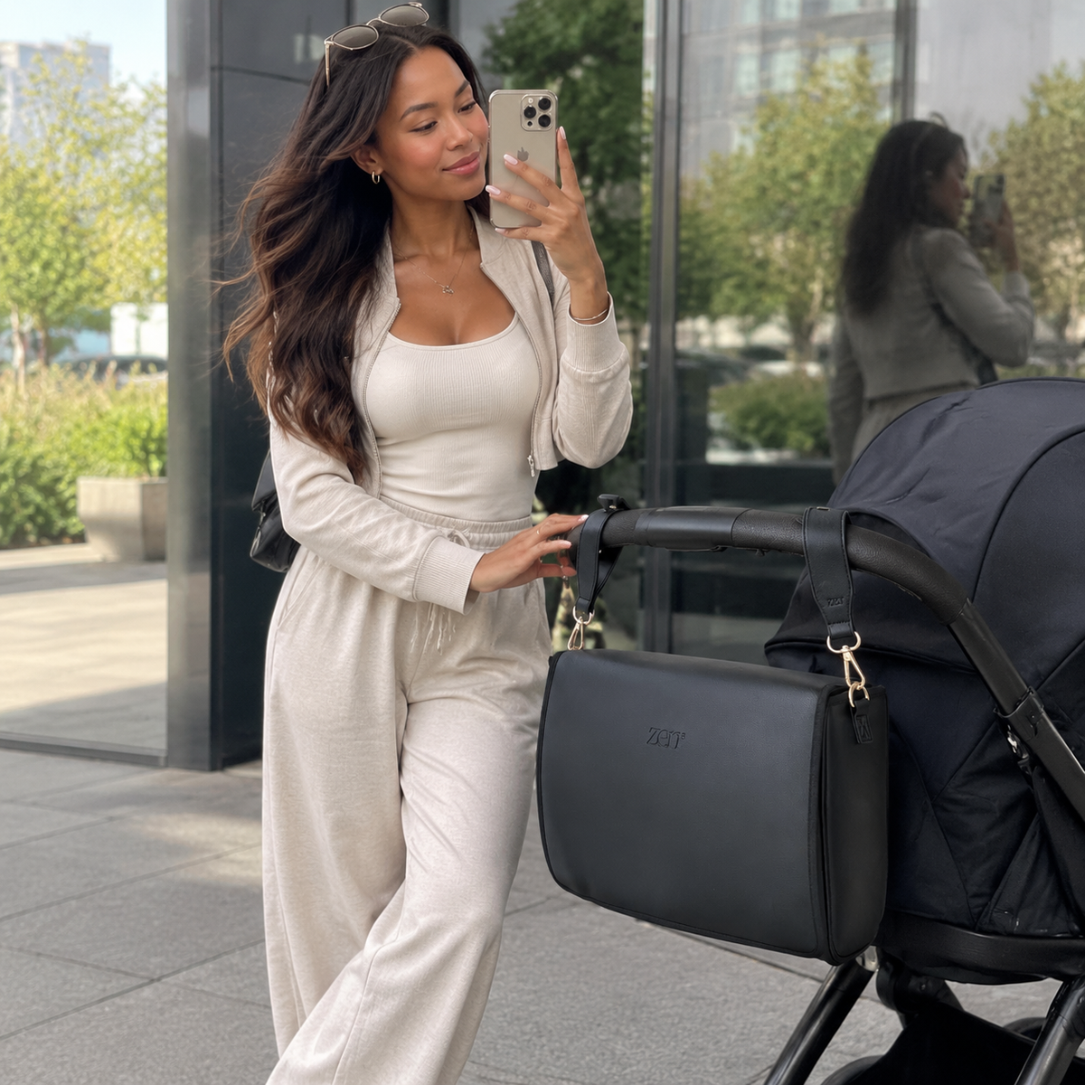 zen3 vegan leather changing bag attached to stroller